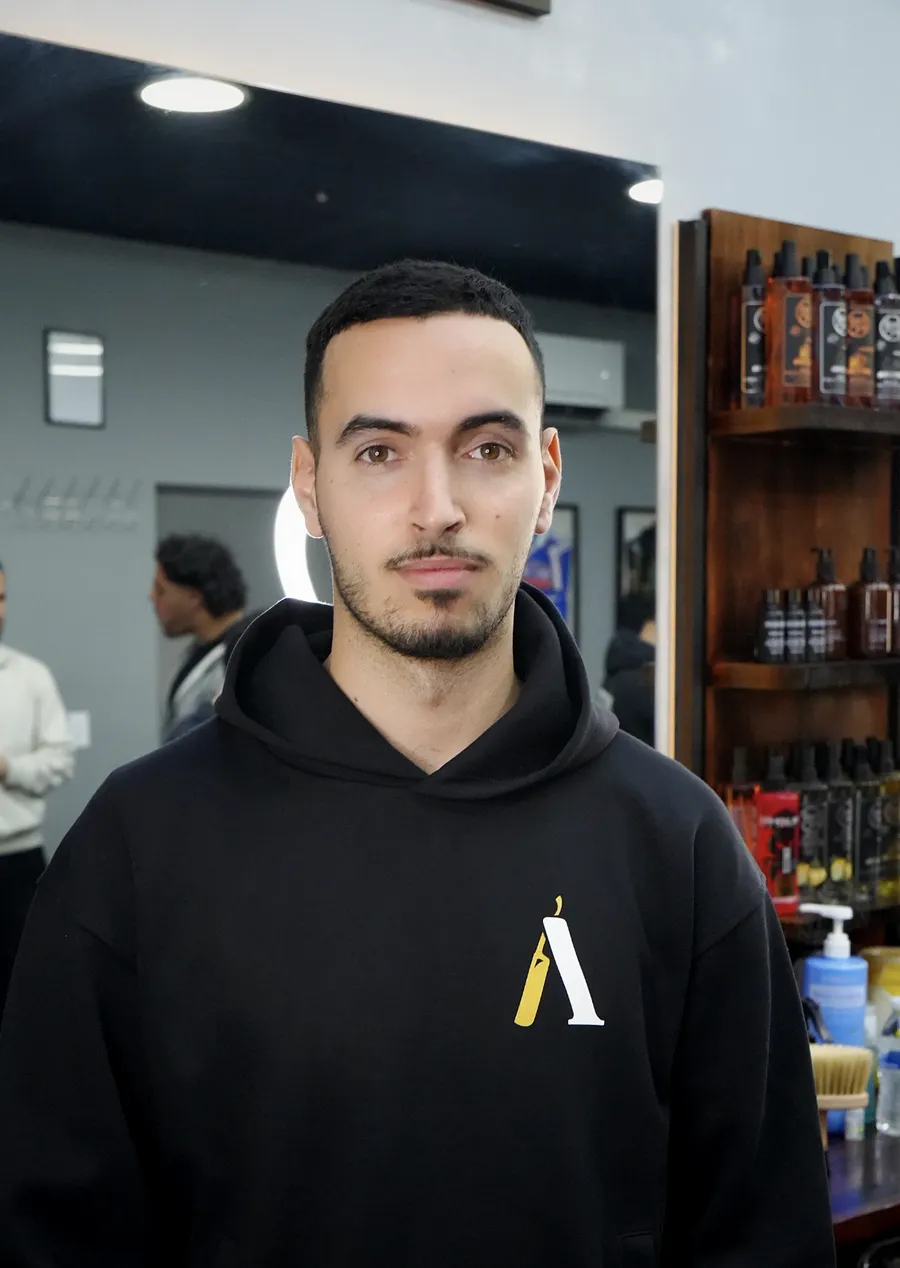 Tarek, barber at Atta Barbershop